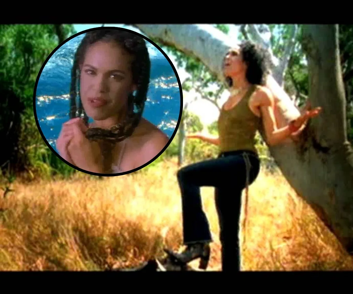 A woman is dancing and singing.