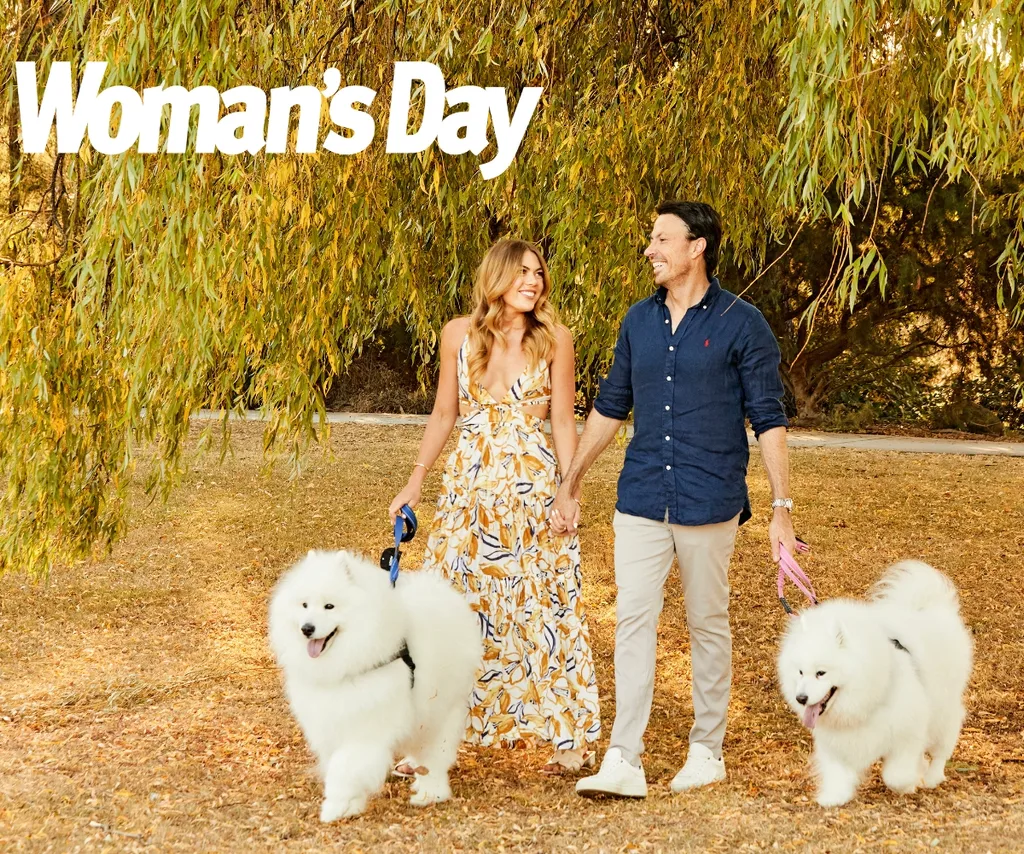 Jacqui and Clint take a walk in the park with Clint's two dogs.