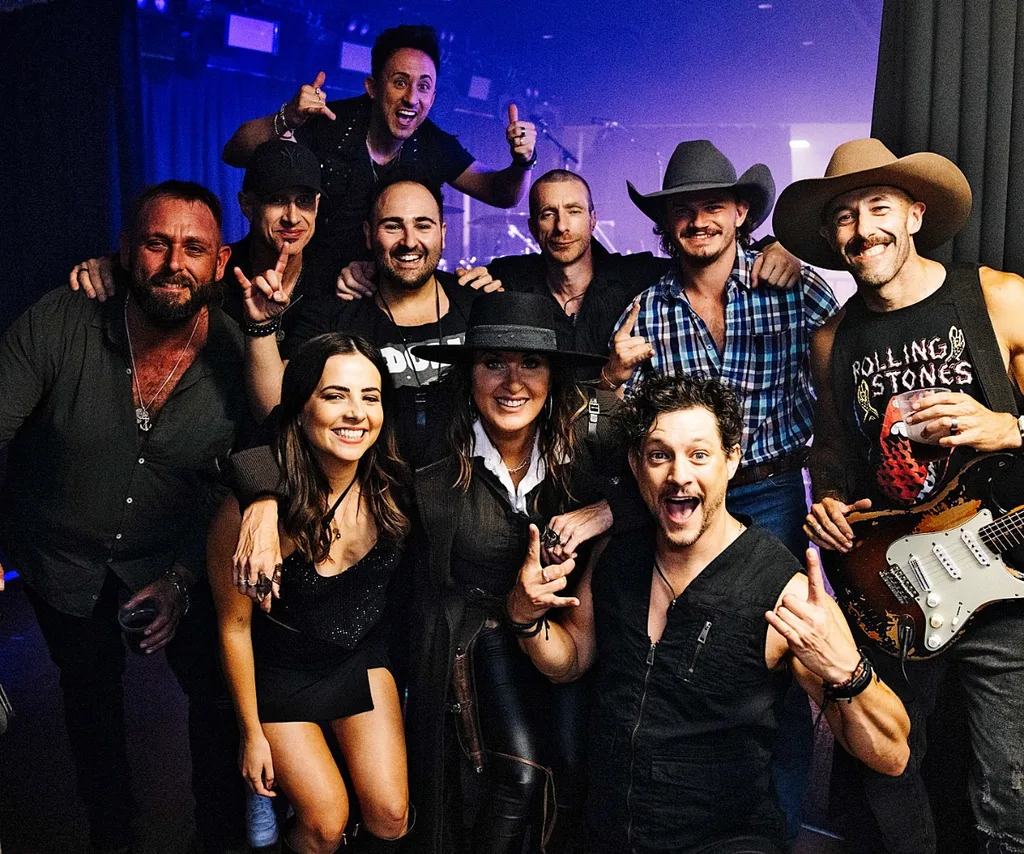 Jarrad poses with a group of musicians including Australian Idol's Rob Mills.