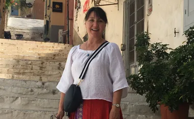 Dr Penny Mackieson on steps in Nafplion, Greece. (Image: Supplied)