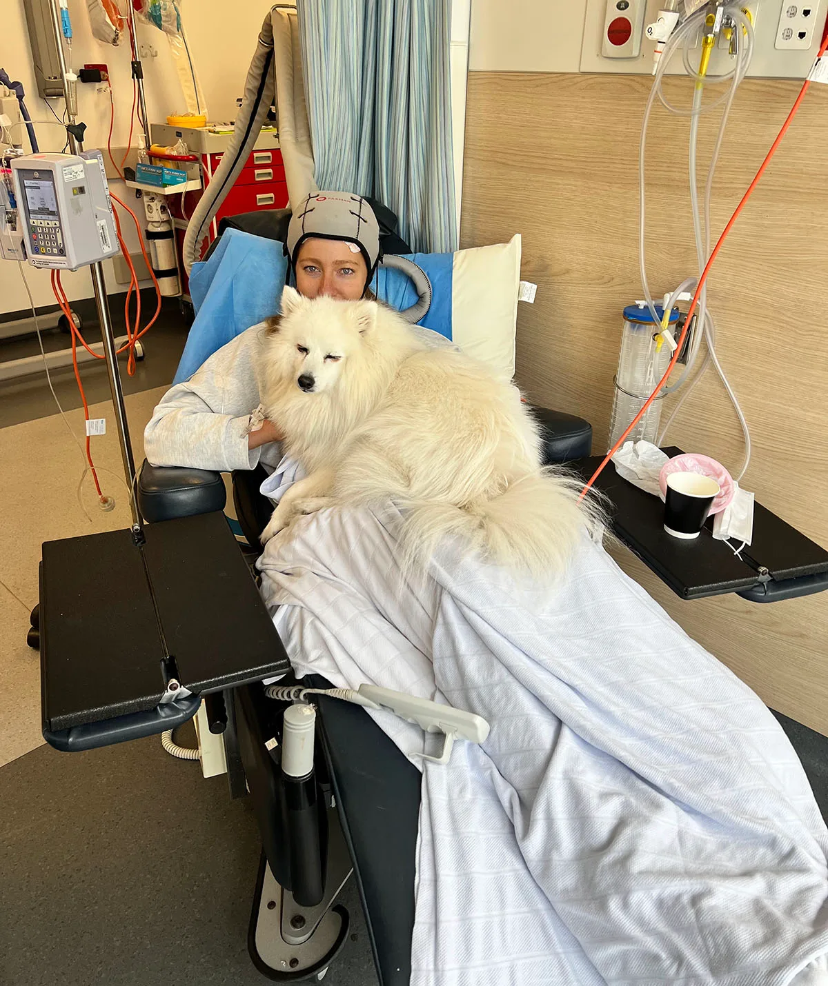 Wolfie kept me company during chemo with a scalp cooling cap. (Image: Supplied)