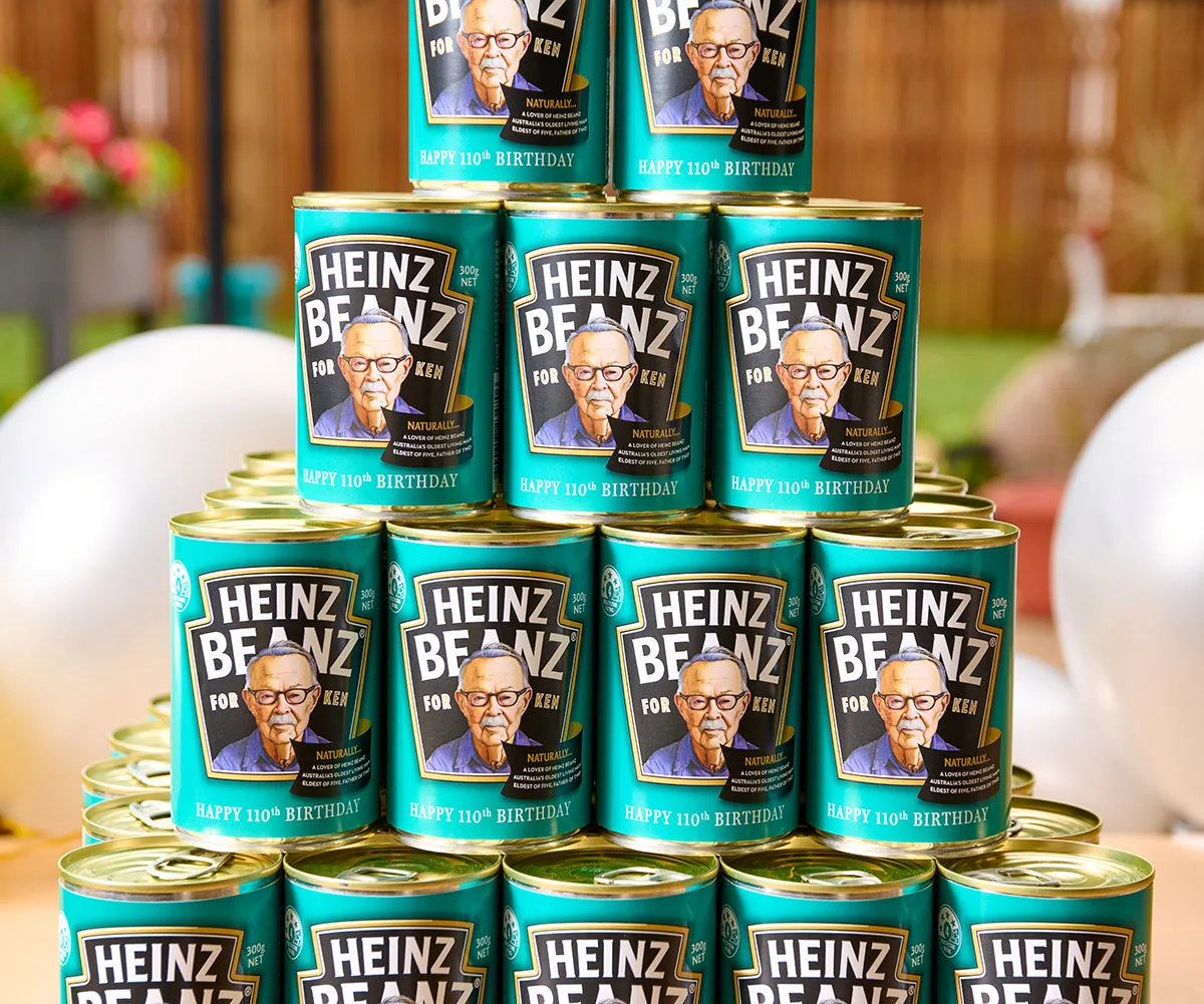 In celebration of the 110th birthday of Australia's oldest known living man, Heinz Australia has produced a personalised limited run of baked beans for Whiddon Grafton resident – and keen baked bean enthusiast – Kenneth Weeks. (Image: Supplied)