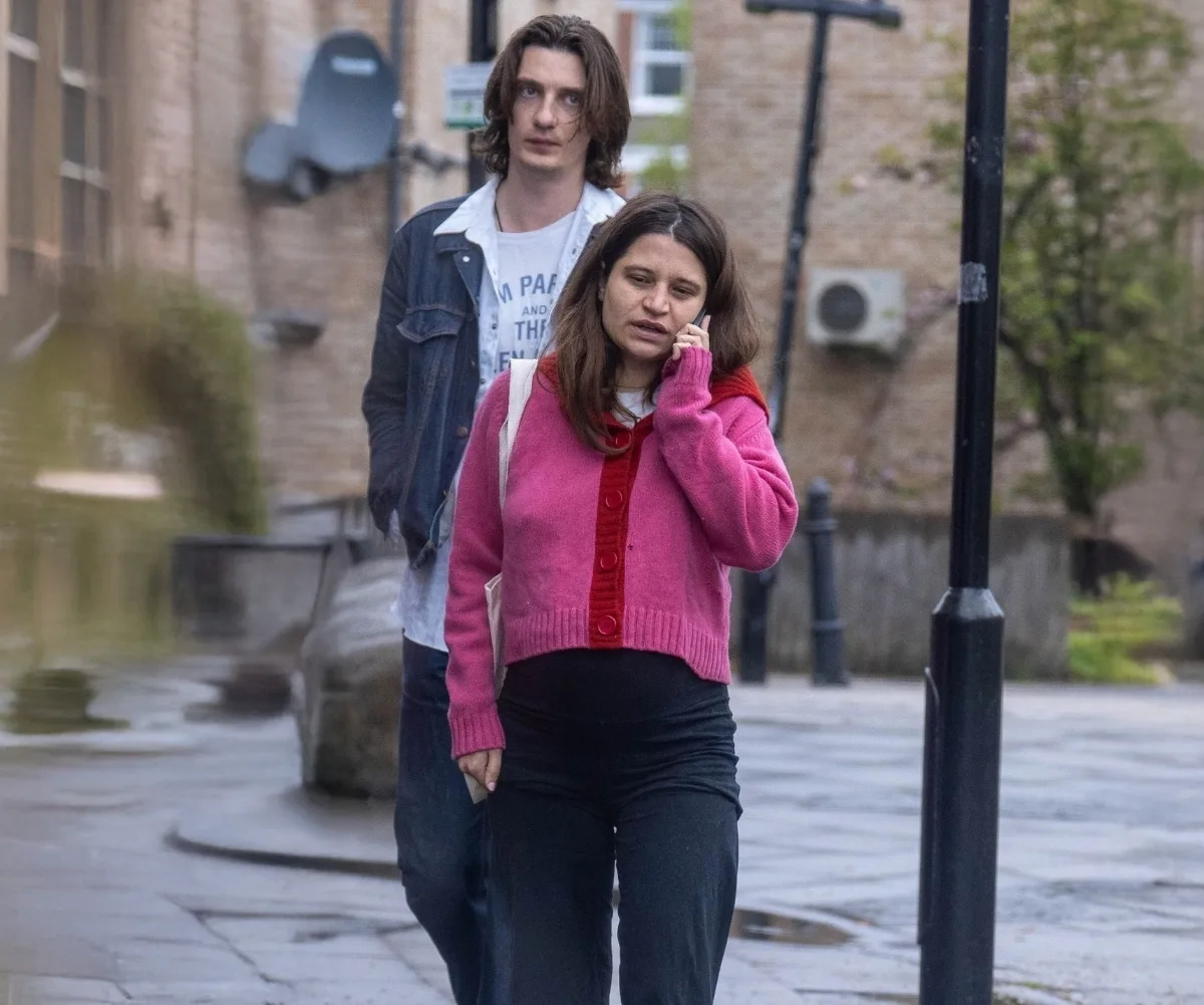 Tiger Lily walking through the streets of London with her husband