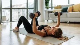 Woman doing an at home gym workout