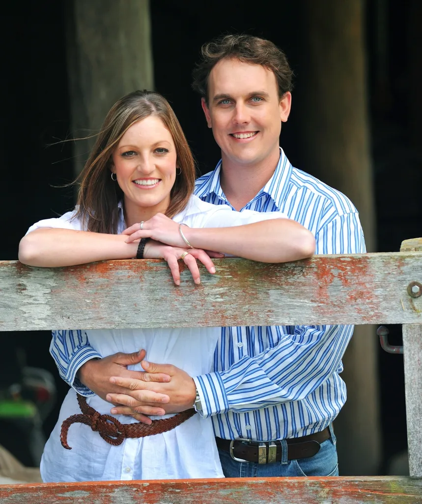 Brad and Stacie pose together on a wooden fence back in 2009.