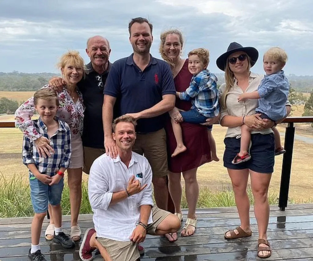 Wally Lewis poses with his family.