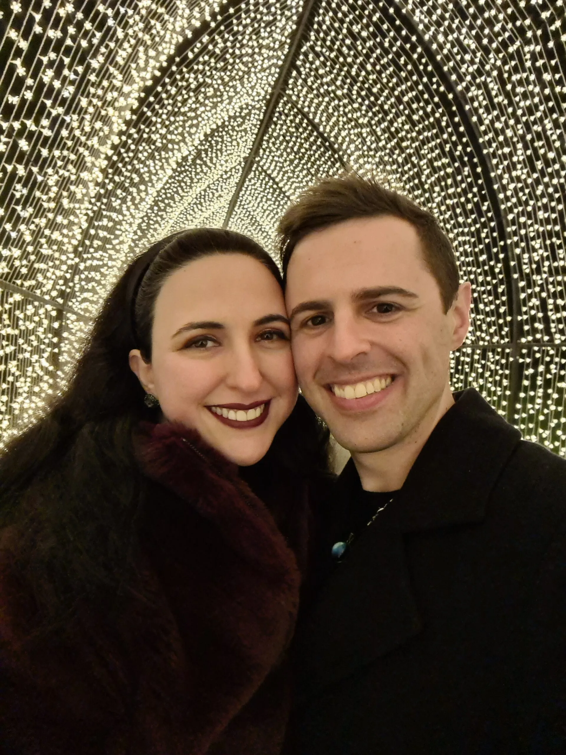 Elinor and Daniel in a fairy lit tunnel