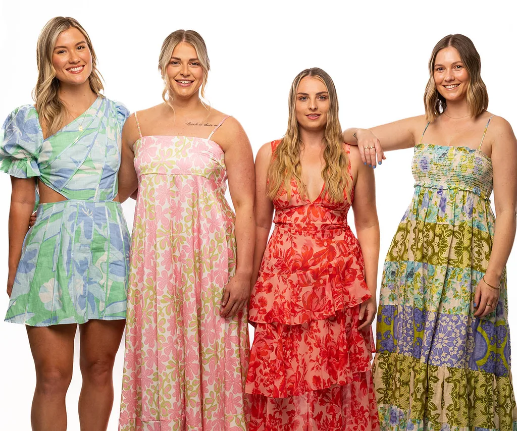 Corey's new ladies - Chloe, Kailey, Amberlee and Annie - all wearing dresses, stand in a row.