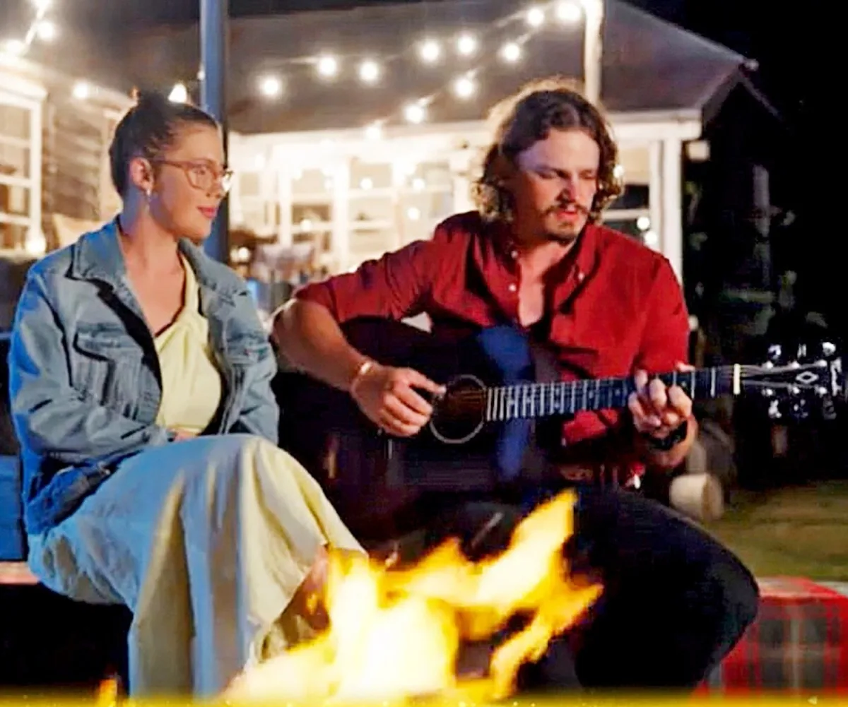 Farmer Jarrad is seen serenading Chloe in a still from Farmer Wants A Wife