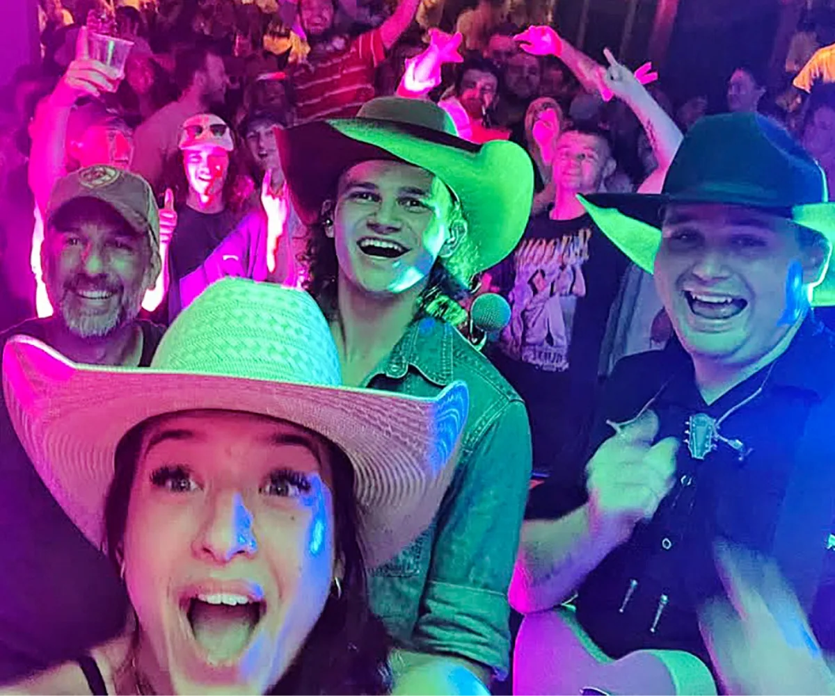 Jarrad appears in a selfie with his band and ex Tyla