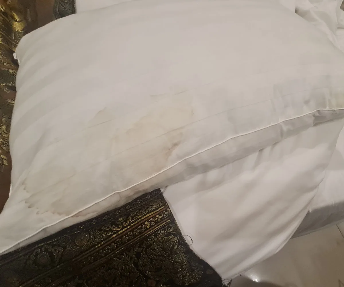 The dirty pillows in the hotel room in Thailand. (Image: Supplied)