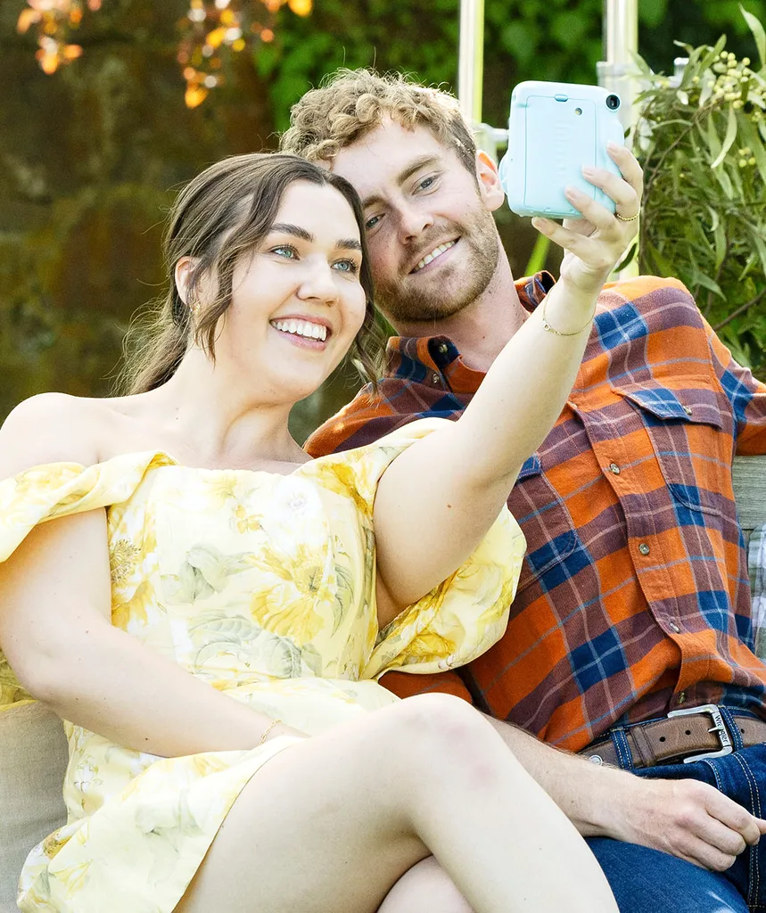 Rebecca leans towards Jack and takes a selfie of the two of them together during the speed dates.