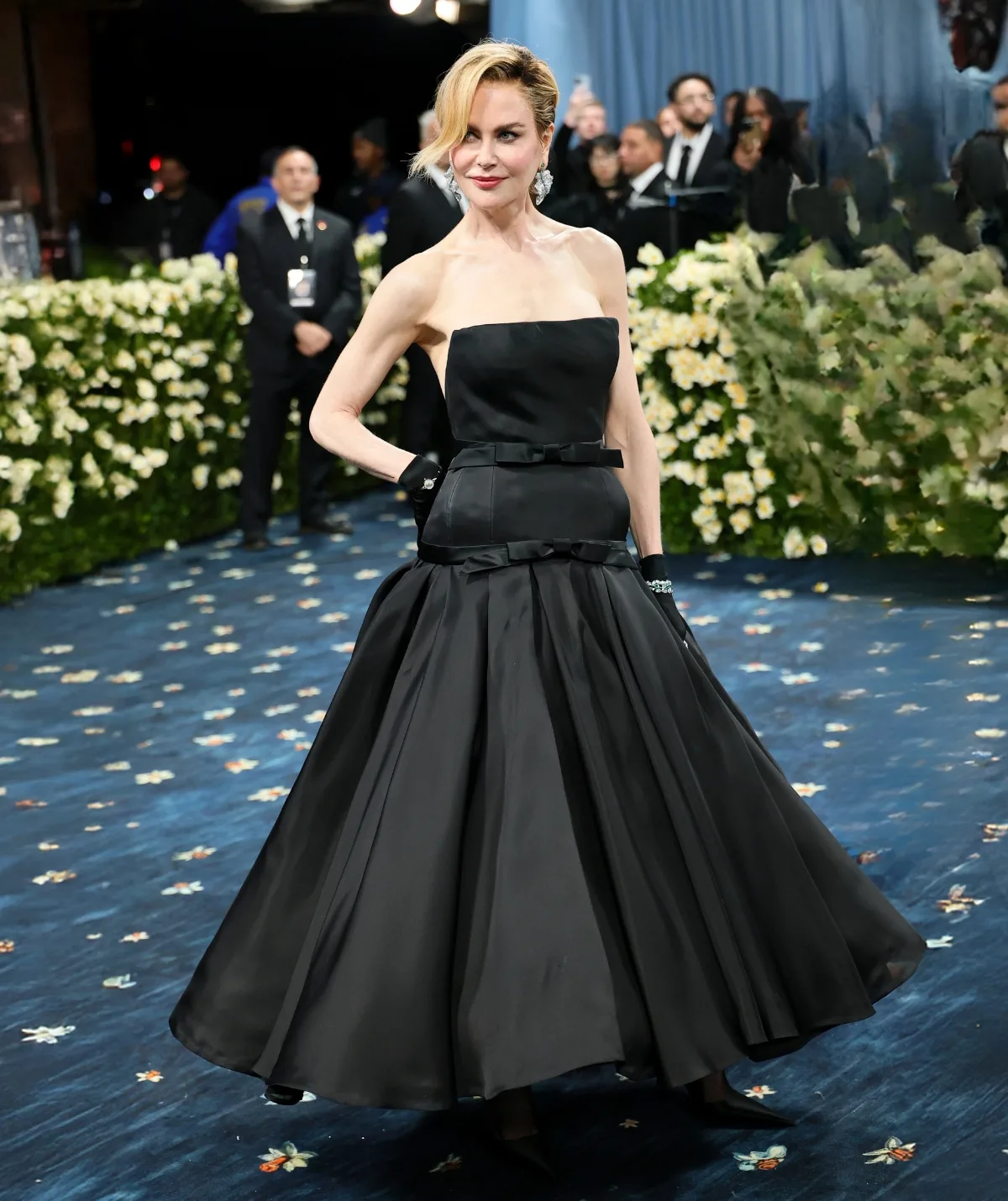 Dandy darling! The actress wore a black vintage-inspired Balenciaga gown. (Image: Getty)