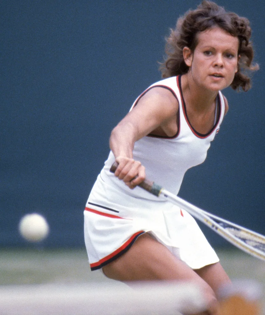 A woman playing tennis