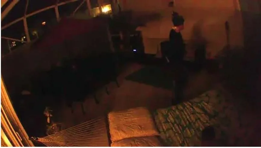 ecurity footage reveals an image of a figure lurking on Gretchen Anthony's patio
