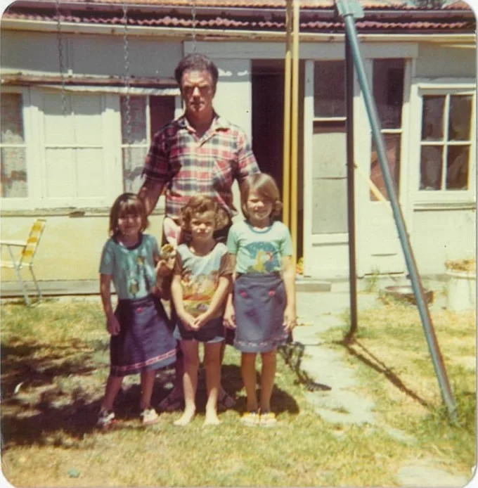 Peter Norris with his father (centre), his sister Tina (left) and his other sister Kelly (right)