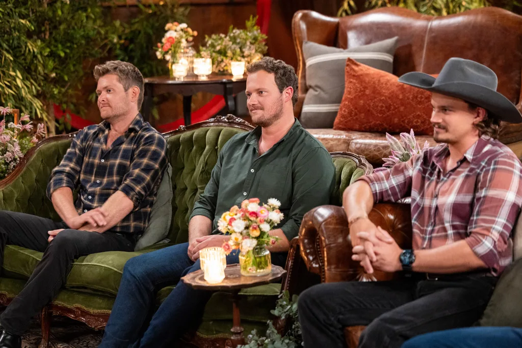 Thomas, Corey and Jarrad sit next to each other on the couch at the Farmer Wants A Wife reunion.