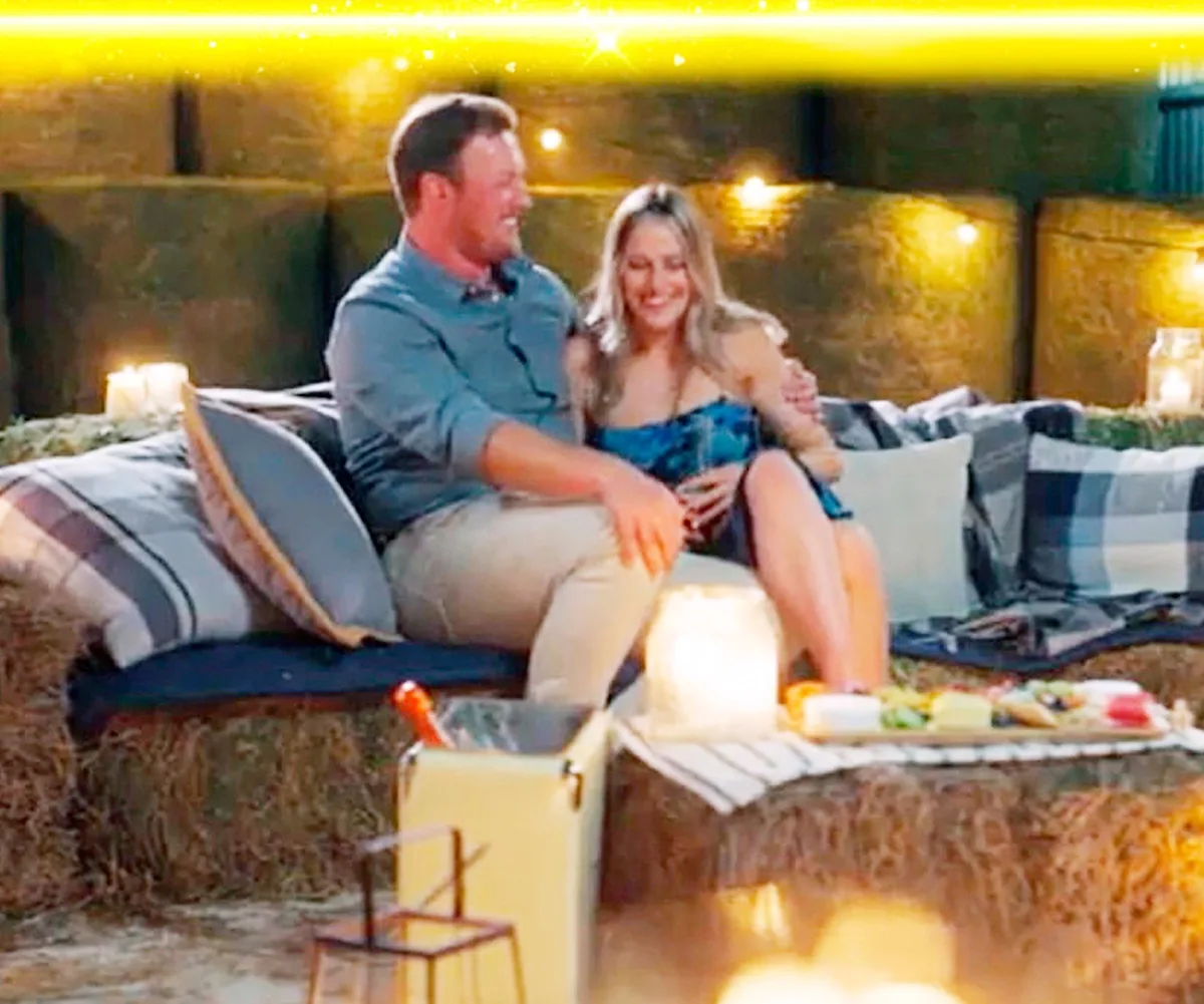 Farmer Corey and Keeley cosy up together in a still from Farmer Wants A Wife