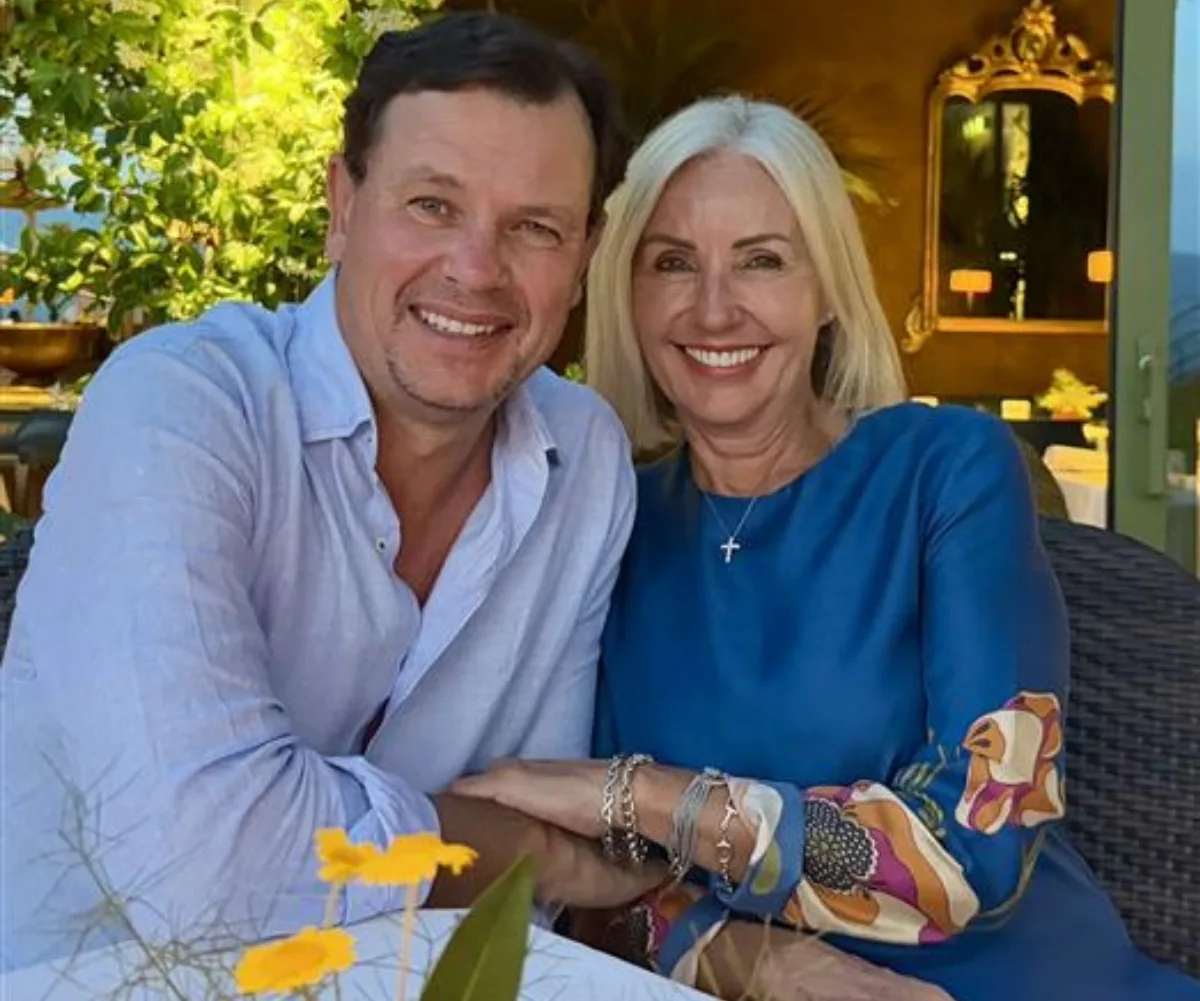 Mark and Jane Ferguson smile over lunch