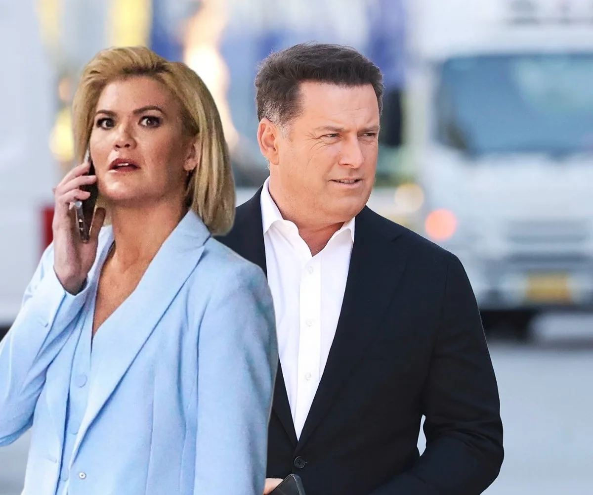 Sarah Harris looks tense as she takes a phone call while Karl Stefanovic stands behind her in a suit