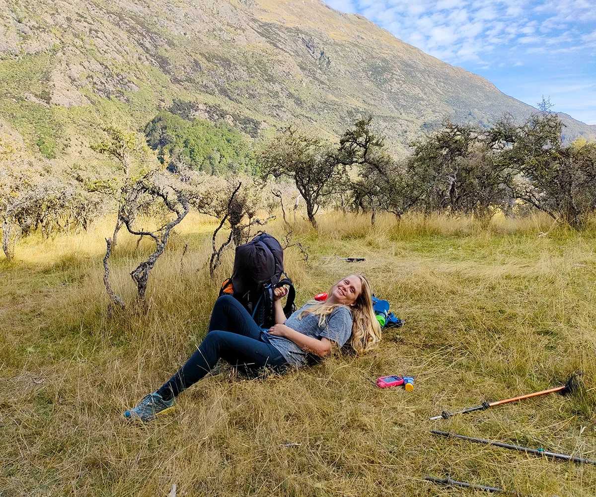 Me taking a break 3km into the Greenstone Track, still recovering from concussion. (Image: Supplied)