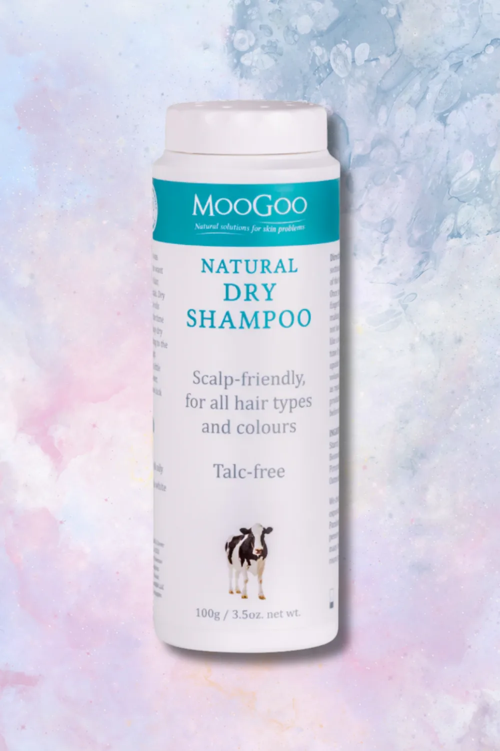 MooGoo Natural Dry Shampoo on marble background