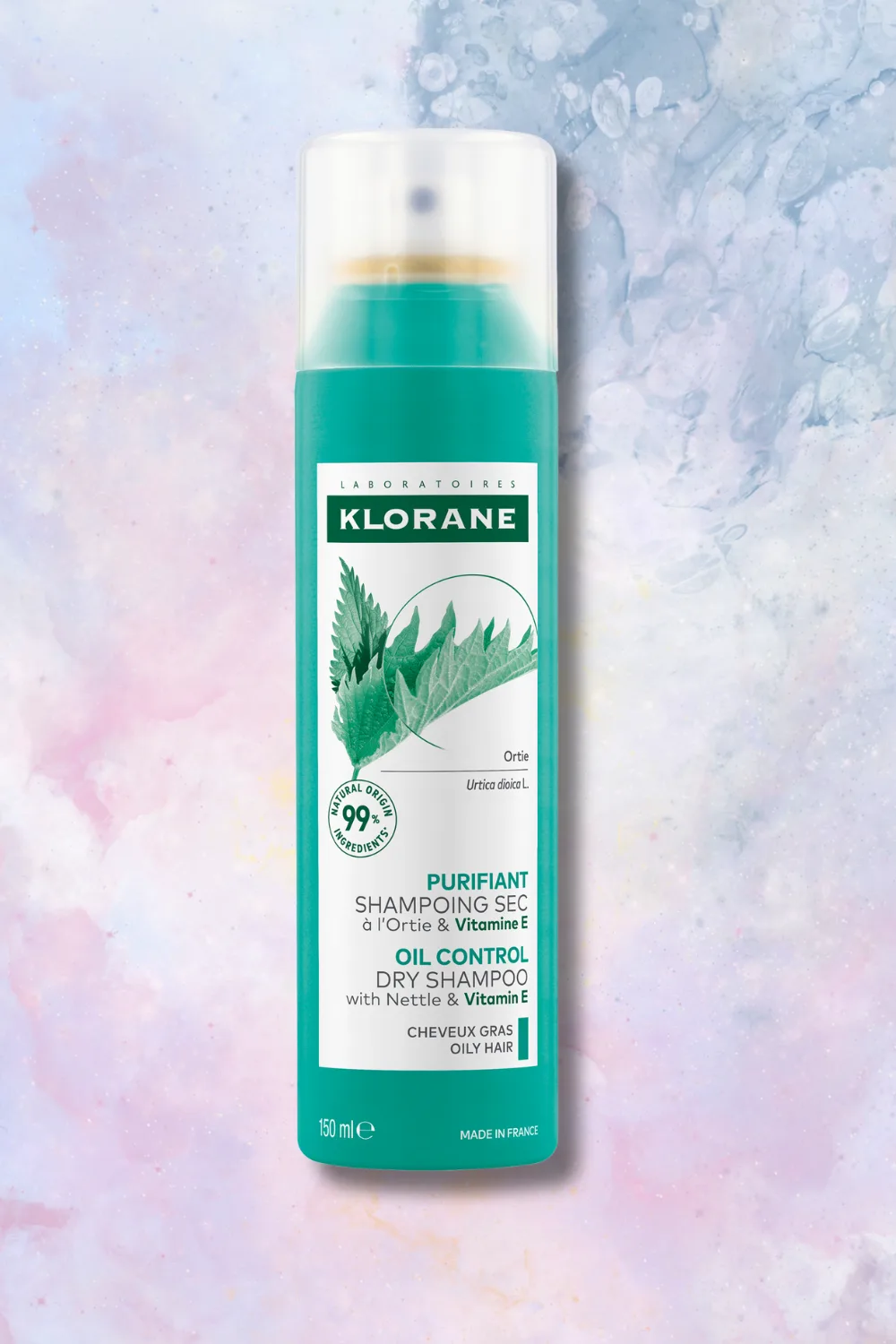 Klorane Dry Shampoo with Nettle & Vitamin E on marble background