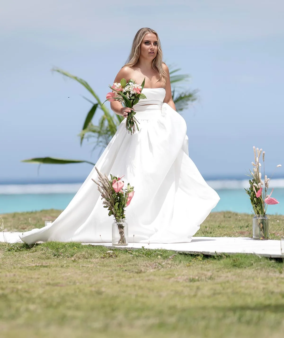 As Amy walks down the aisle in her bridal gown to meet her husband she looks horrified. 