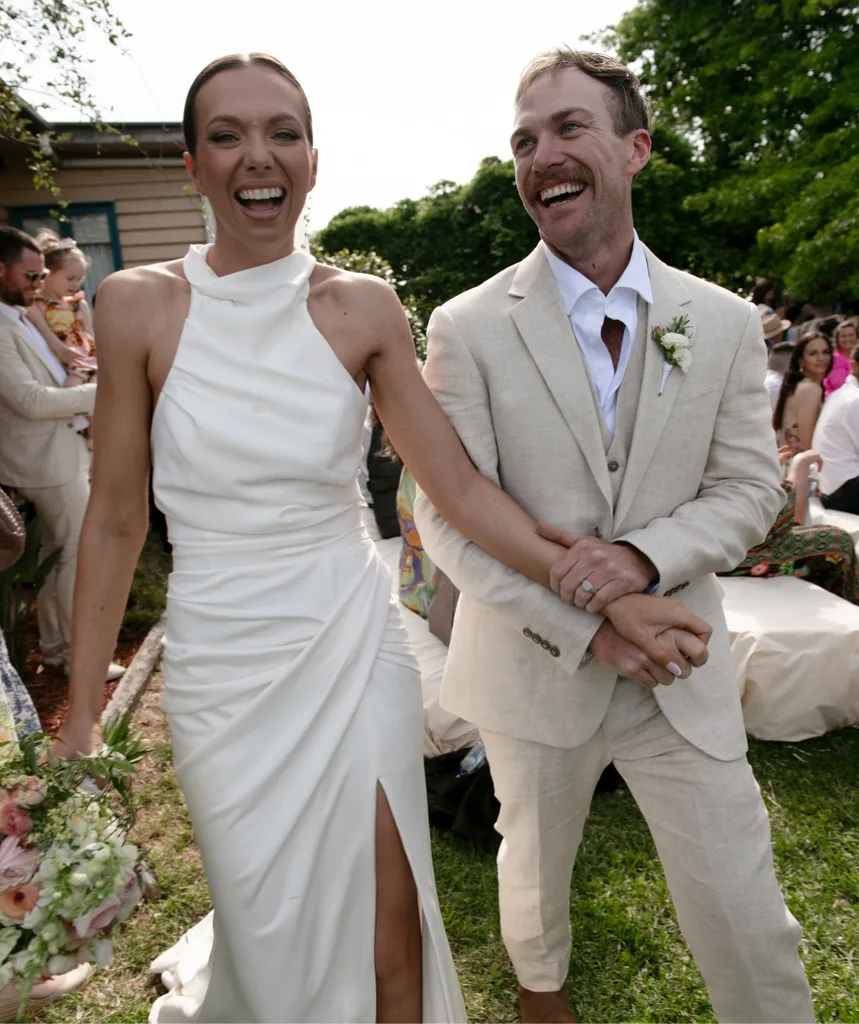 Farmer David and Emily rejoice after being officially married.