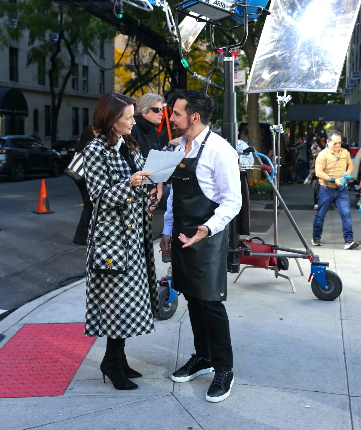Spotted on set! The duo met on set and now John has popped by the And Just Like That set! (Image: Getty)
