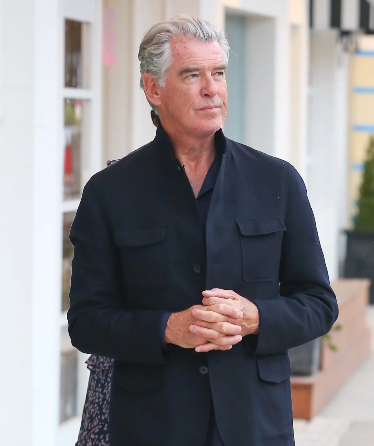 Pierce is papped walking through the streets.