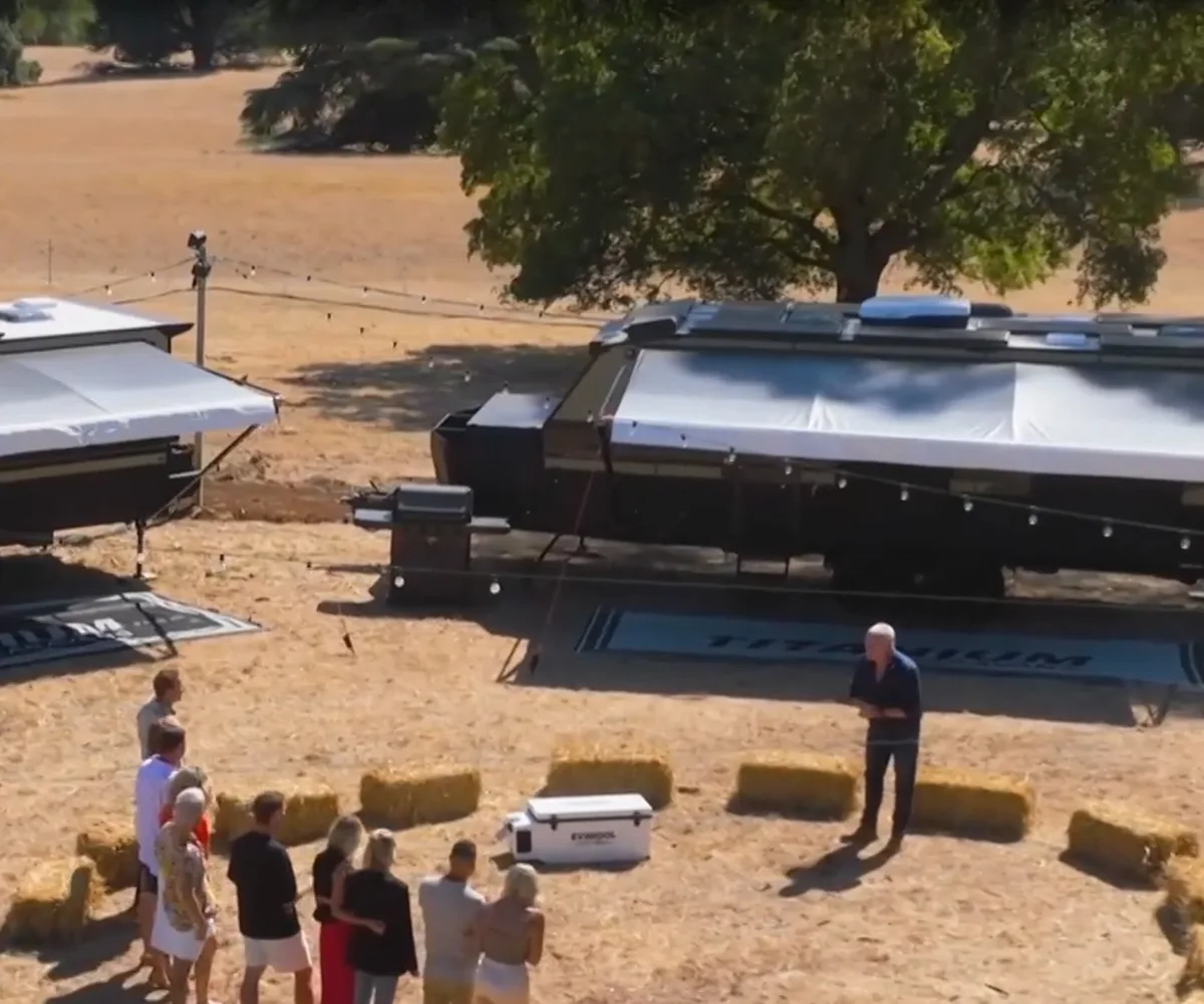 Scott and the cast out the front of their 'caravan village' on The Block.