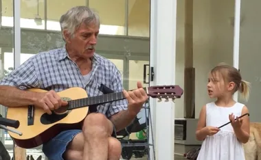 Holly's dad Gerry and daughter Sofia singing and playing ‘You are my sunshine’. (Image: Supplied)