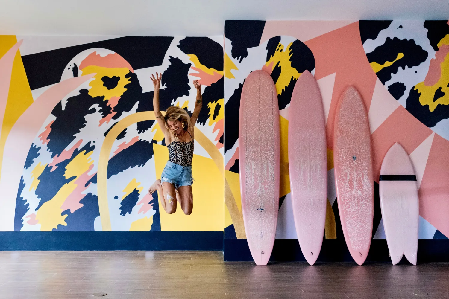 Pepa Ivanoff in Tamarindo, Costa Rica, painting a mural