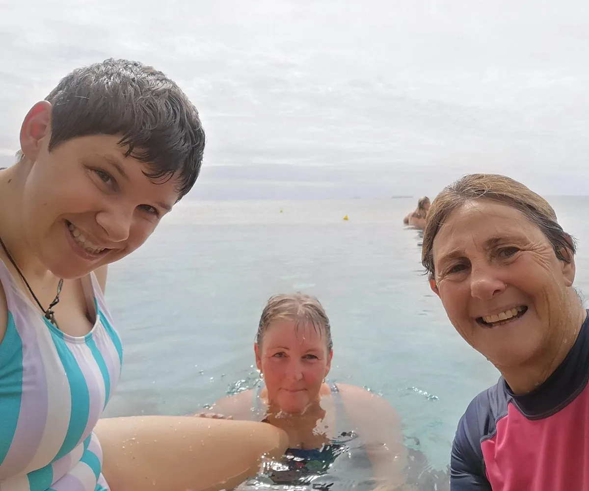 Me with Maxine (swimming coach & friend) and Deenna (support worker). (Image: Supplied)