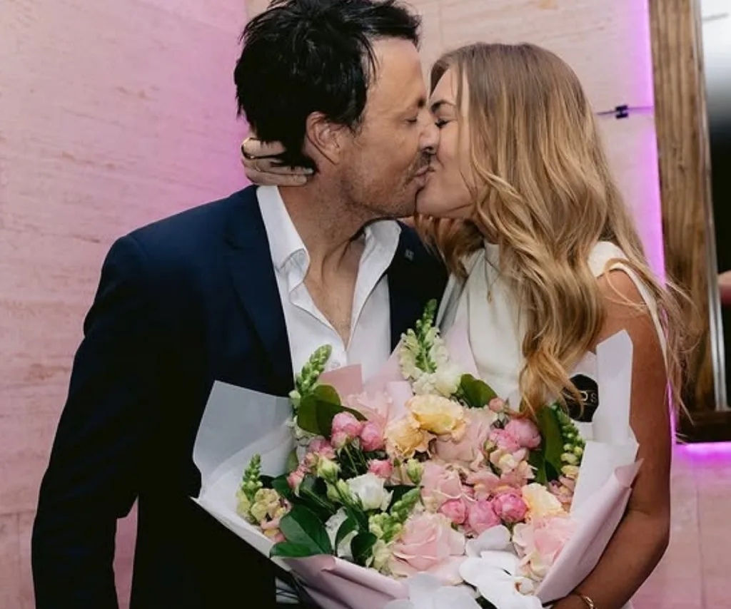 Jacqui and Clint share a kiss