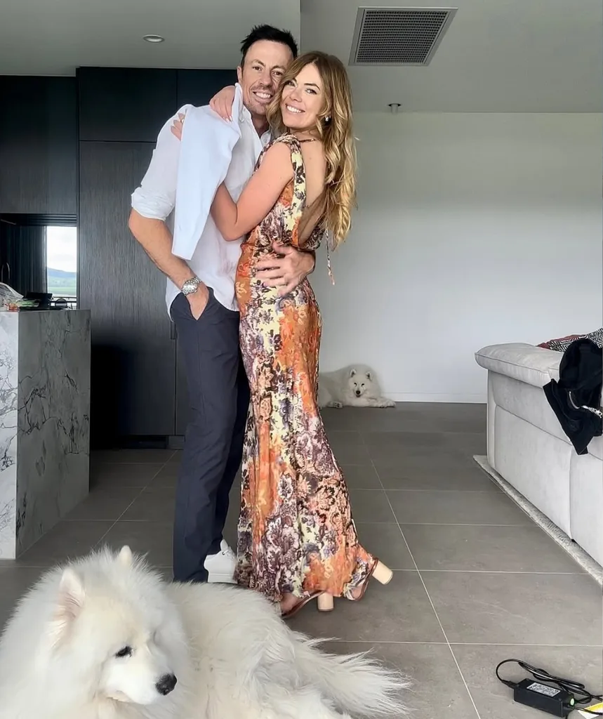 Jacqui snuggles up to her fiance Clint Rice