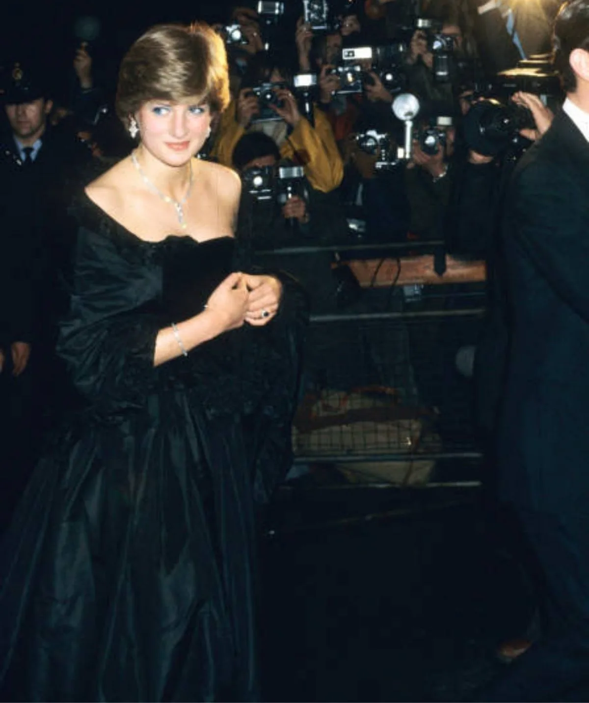 Princess Diana wearing a black taffeta dress.