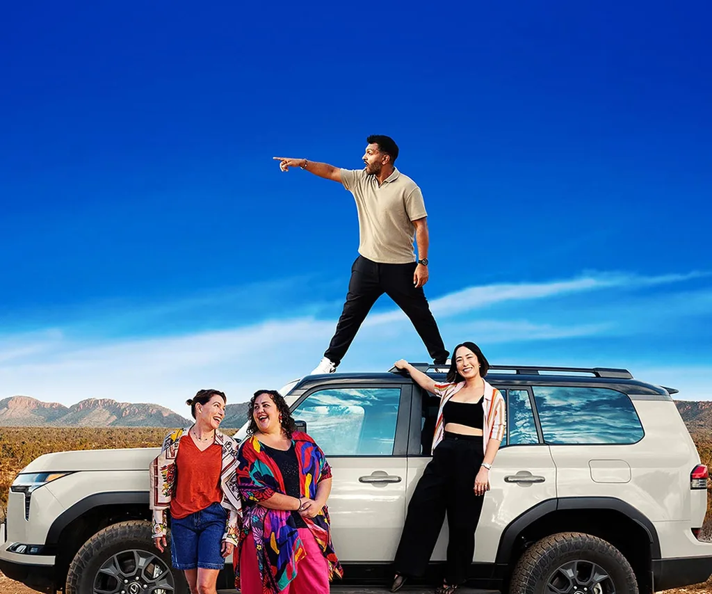 Nazeem Hussain stands on top of a car, pointing, while Claudia Karvan, Steph Tisdell and Melissa Leong stand next to the car.