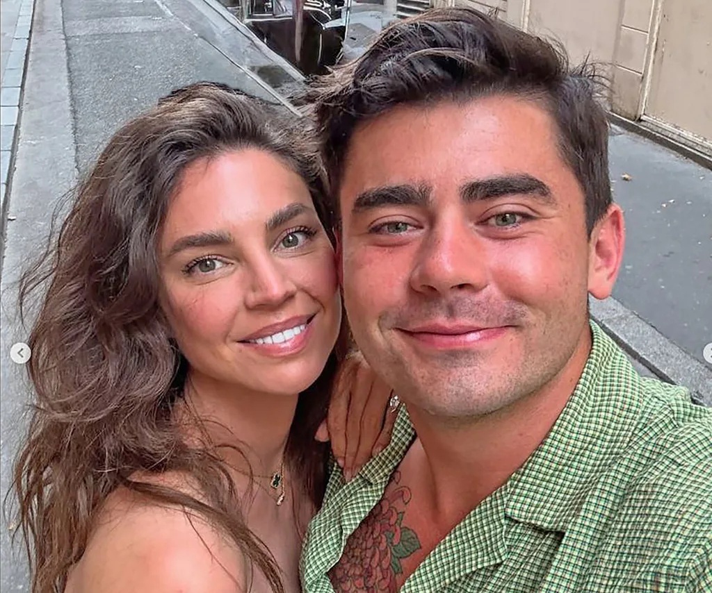 Sarah Todd and Declan Cleary smile in a selfie. He wears a green shirt and she has her brown hair curled and out wavy.