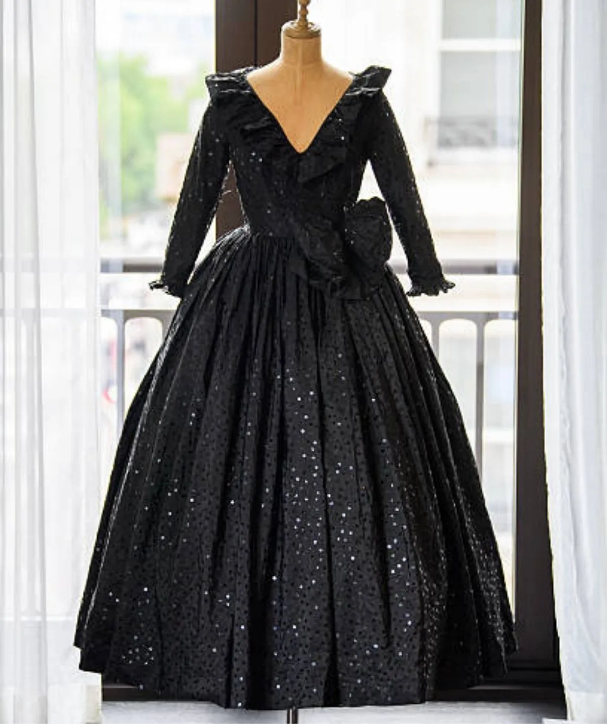 Black taffeta dress designed by Elizabeth Emanuel.