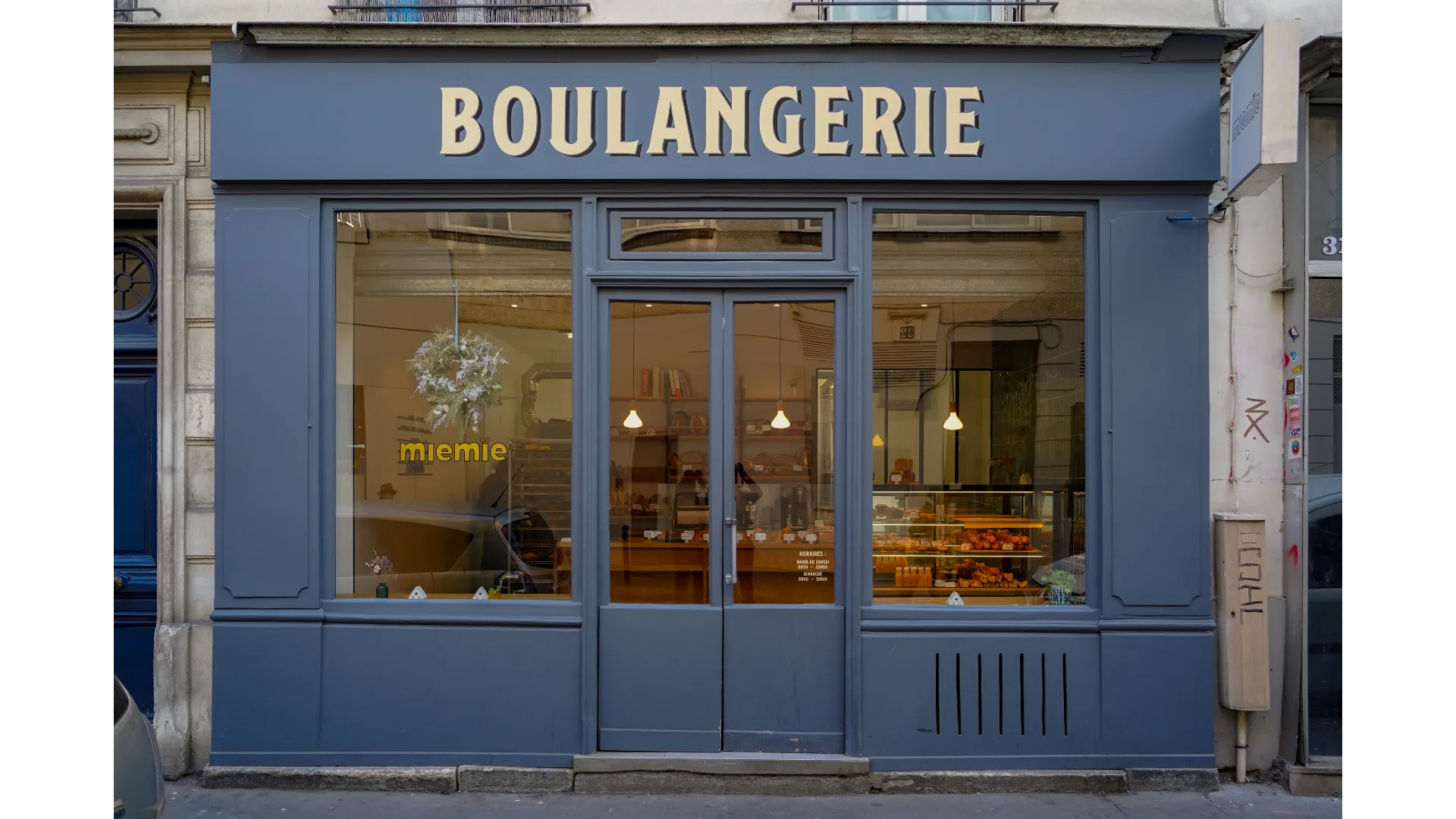 A boulangerie with a blue facade.