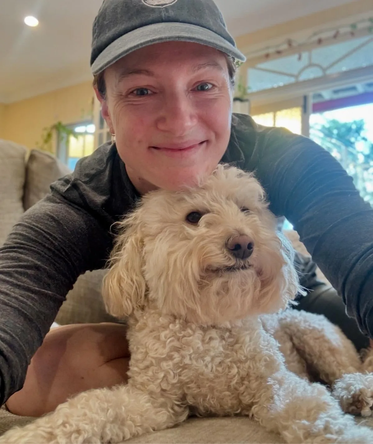 Cate Campbell and her new white cocker spaniel puppy.