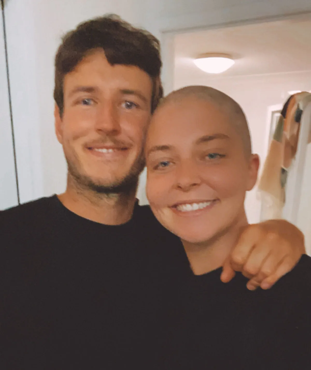 Ryan and Alexandra the day Alexandra shaved her head. 