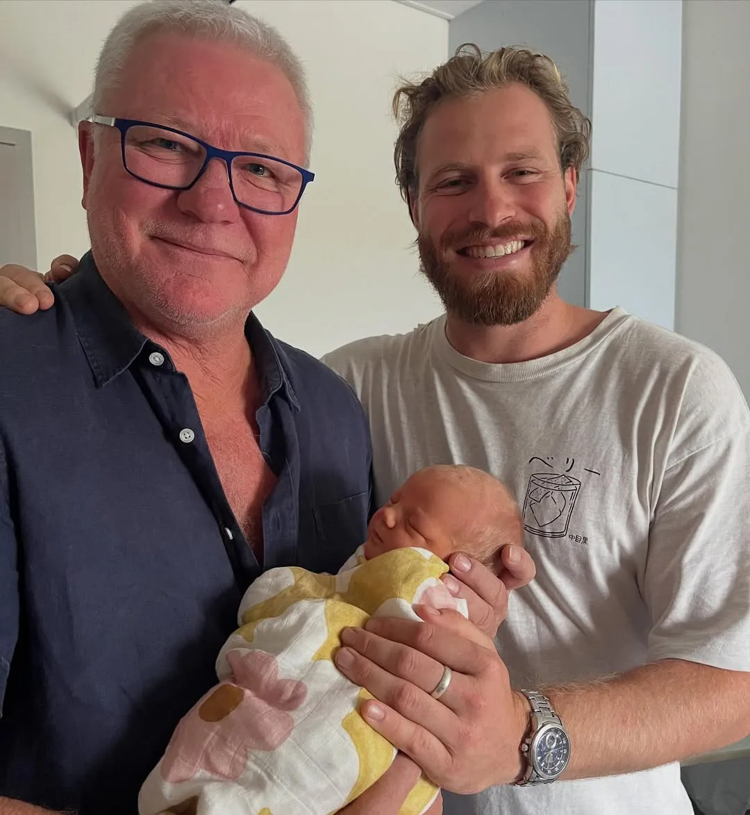 Scott, Charlie and Tiggy pose for a cute family pic.