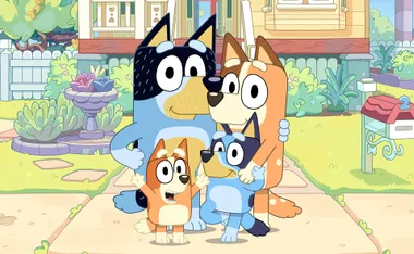 Animated characters Bandit, Chilli, Bluey and Bingo stand in front of their house.