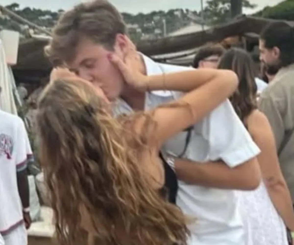Kissing her Prince! Emma and Christian attended the same high school and she has a flat close to the palace. (Image: supplied)