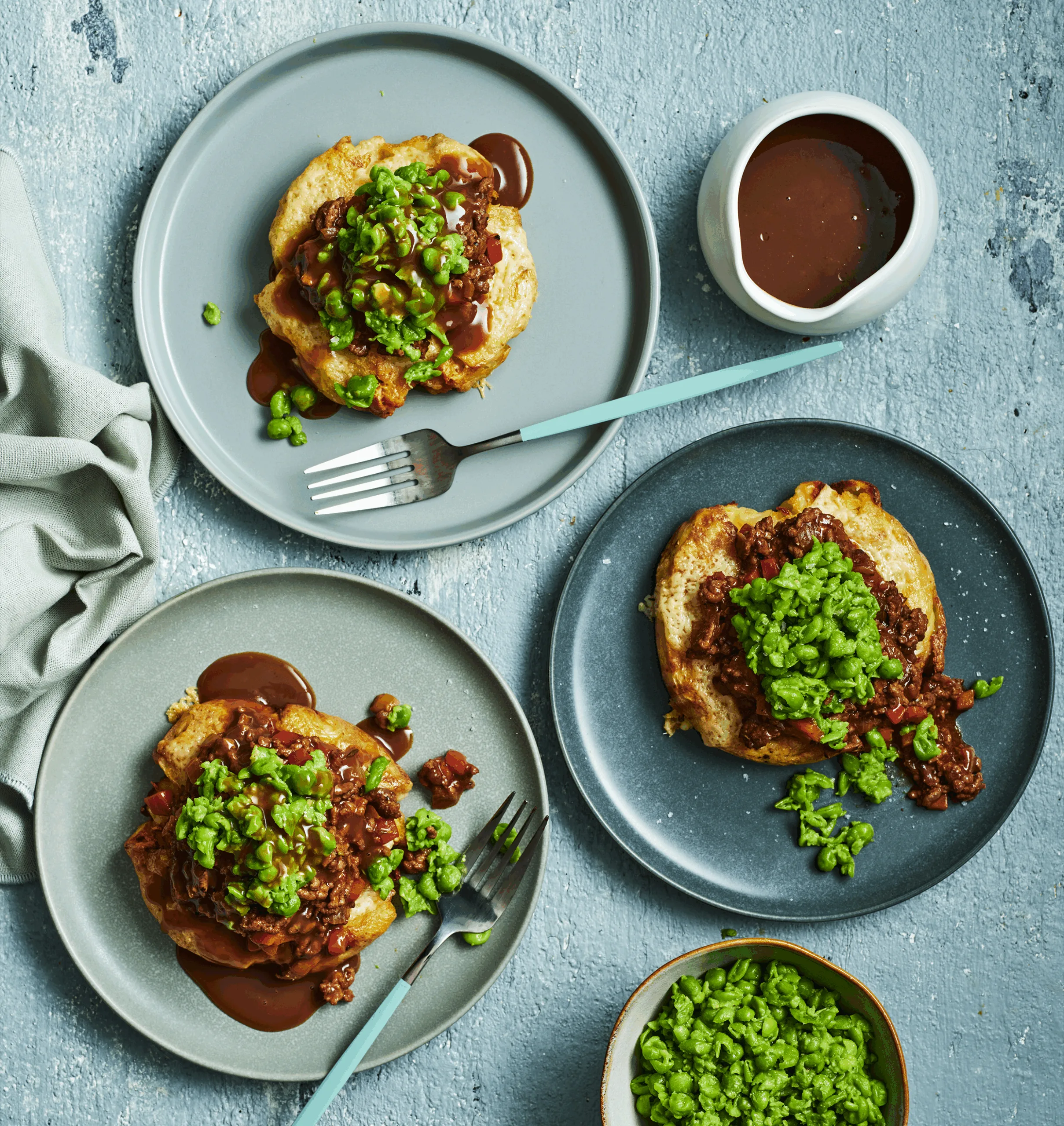 Potato cottage pies with mushy peas