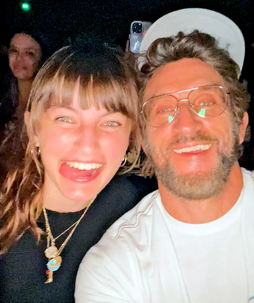 Jonathan and his daughter Tilly smile at the camera.