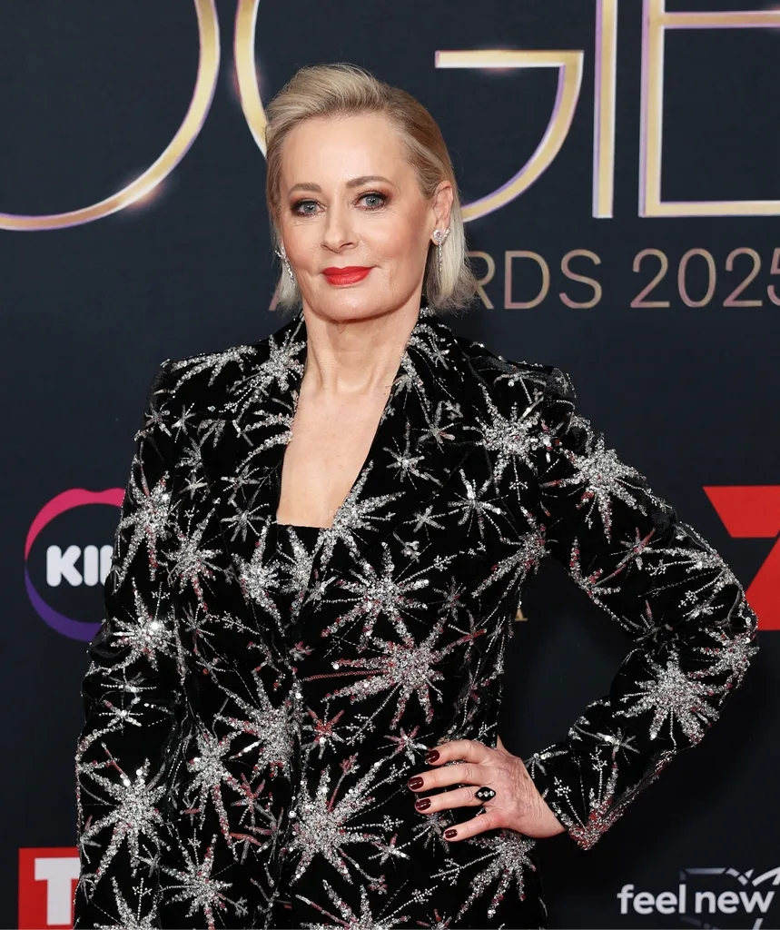 A woman in a suit covered with silver stars